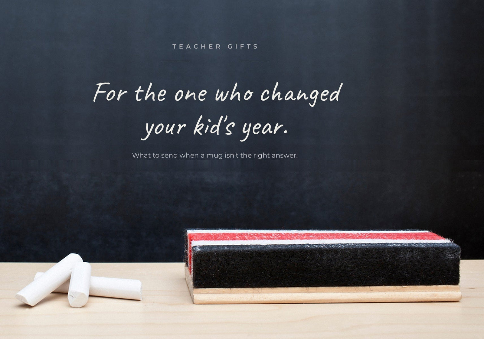 White chalk pieces and a chalkboard eraser resting on a classroom desk beneath an inspirational teacher quote.