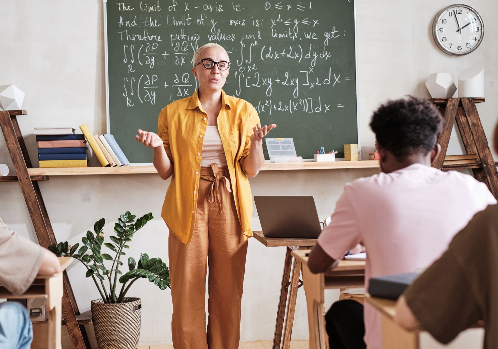 University teacher engaging students during a lecture, the inspiration behind thoughtful gifts.