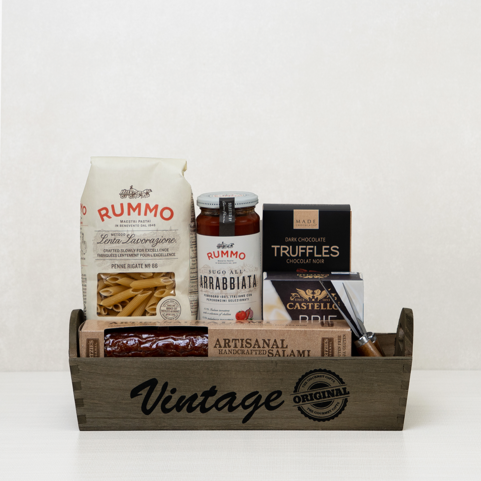 Italian Gourmet Vintage Tray, which includes pasta, sauce, truffles, salami, and more.