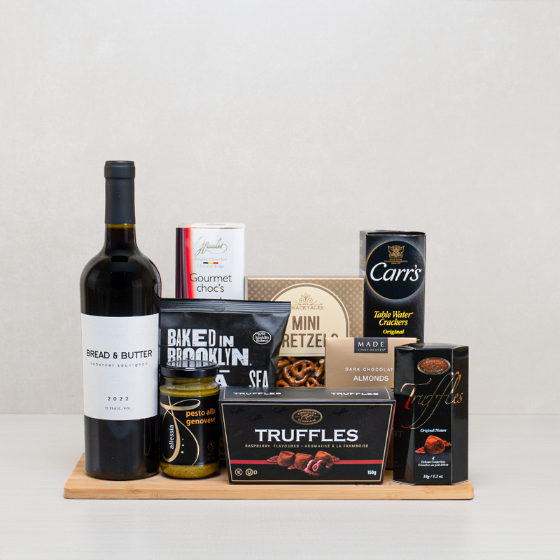 A comforting gourmet basket with treats, pretzels and truffles
