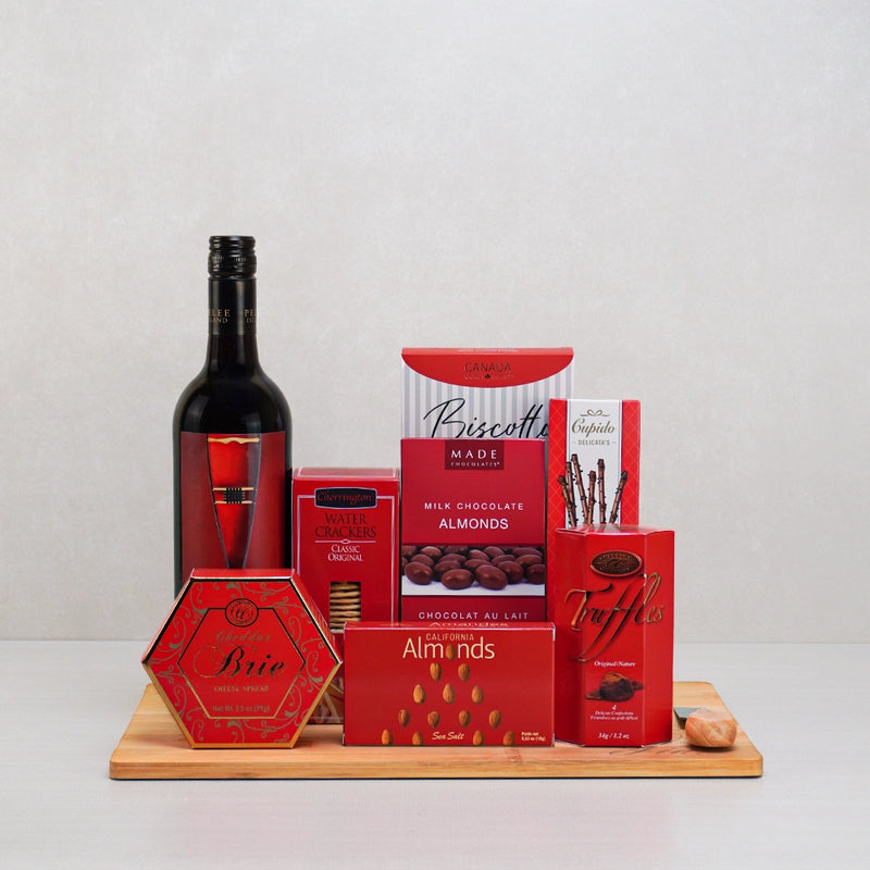 An elegant gourmet gift basket with chocolates and treats for her