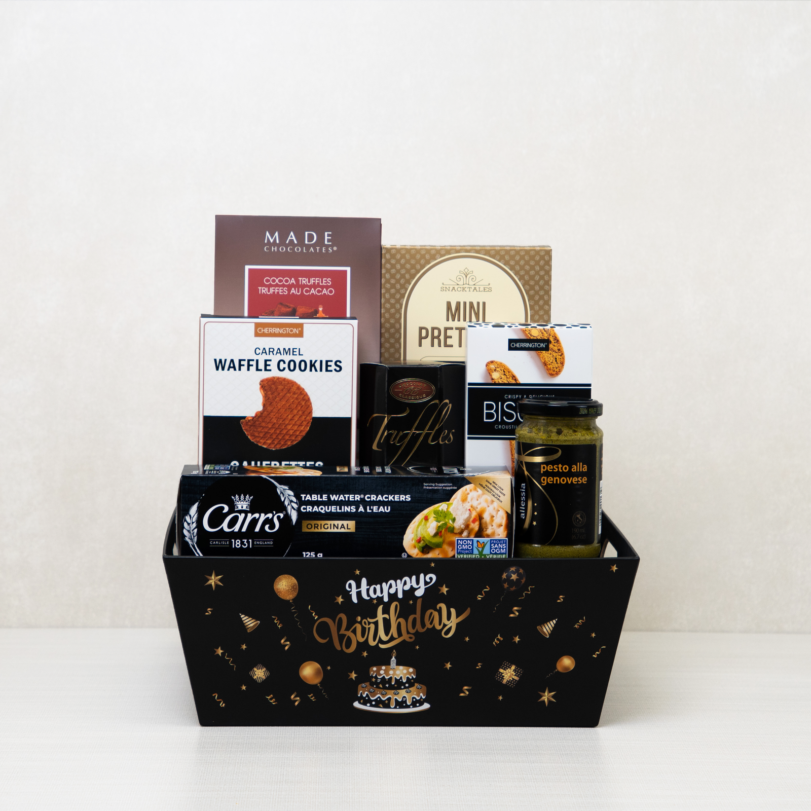 The Ultimate Birthday Treats: Truffles, pretzels, waffle cookies, biscotti, and crackers in a Happy Birthday basket.