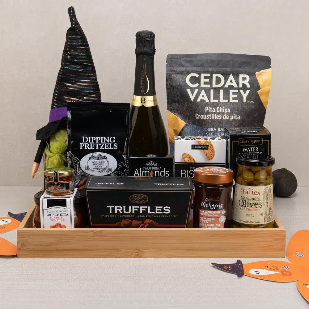 Wickedly Wonderful Gift Basket with Bottega sparkling wine, a witch hat gnome plush, raspberry truffles and manzanilla olives