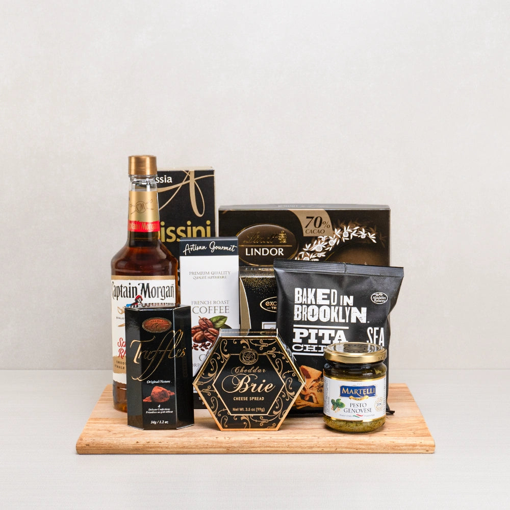 Brooklyn's Bites & Captain's Charm gift set with Captain Morgan spiced rum, Lindt Lindor, pita chips, brie spread and pesto