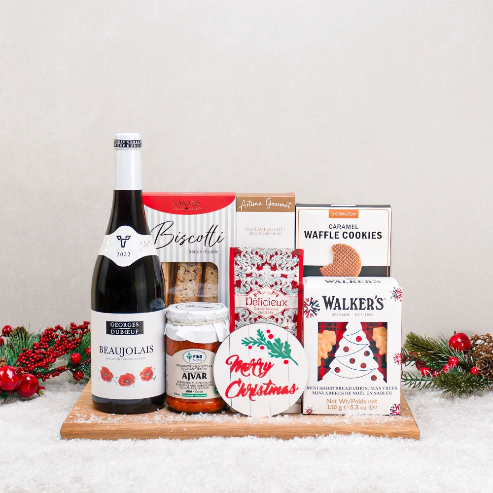 Snow-Kissed Celebration Hamper with Georges Duboeuf Beaujolais, maple biscotti, Walker's shortbread trees and Fino Ajvar