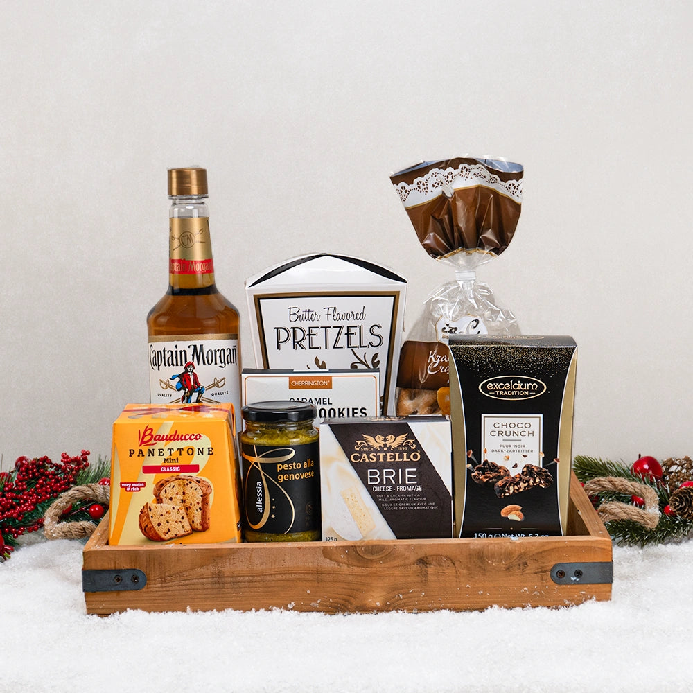 Rum Lover’s Holiday Basket with Captain Morgan spiced rum, Bauducco panettone, Castello brie and Choco Crunch in a wood tray