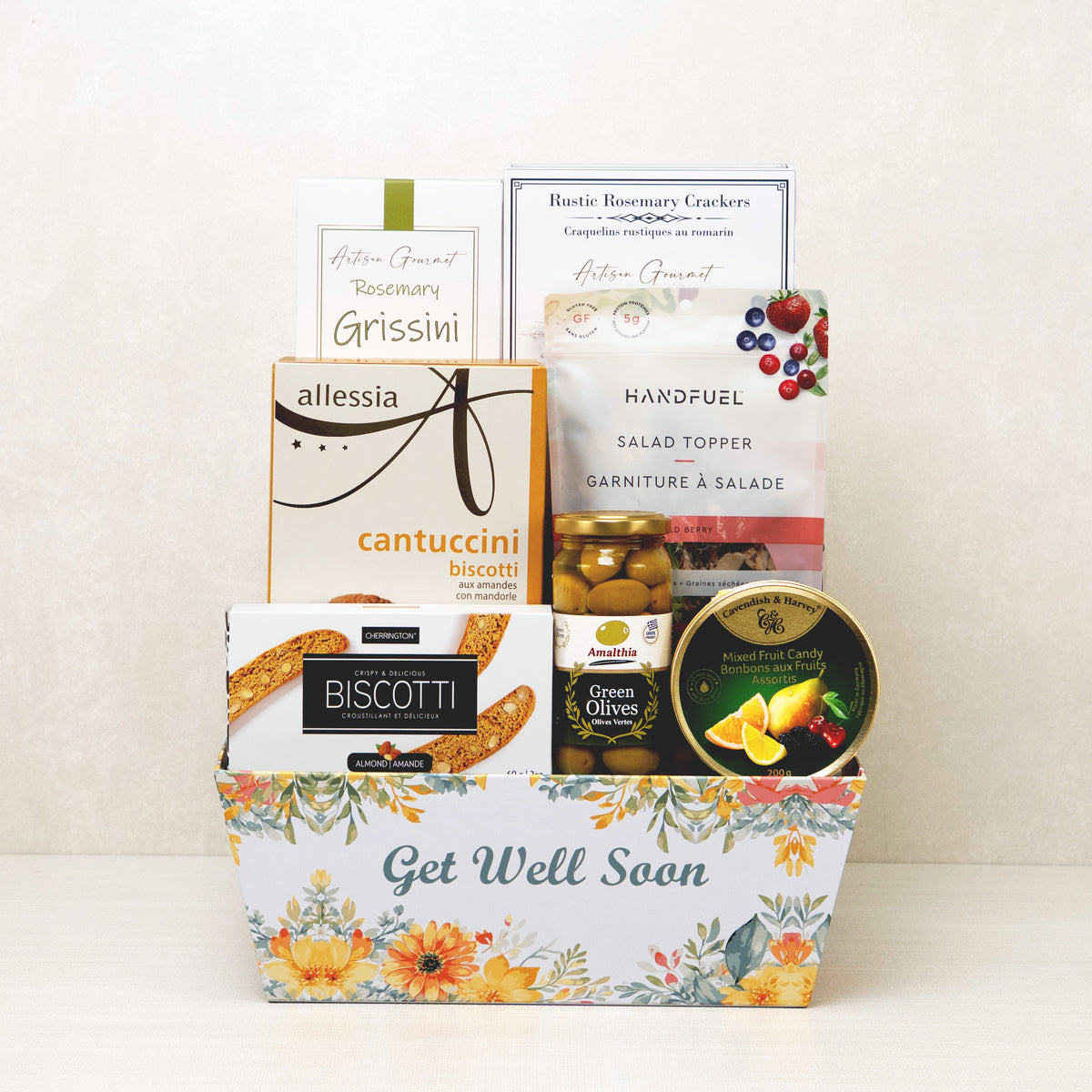 Get Well Goodies Basket with breadsticks, crackers, biscotti, olives, and mixed fruit drops.