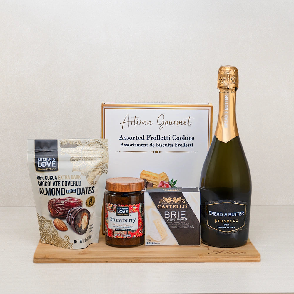 The Sparkling Love Basket with Prosecco, Castello brie, chocolate almond stuffed dates, Frolletti cookies and strawberry jam