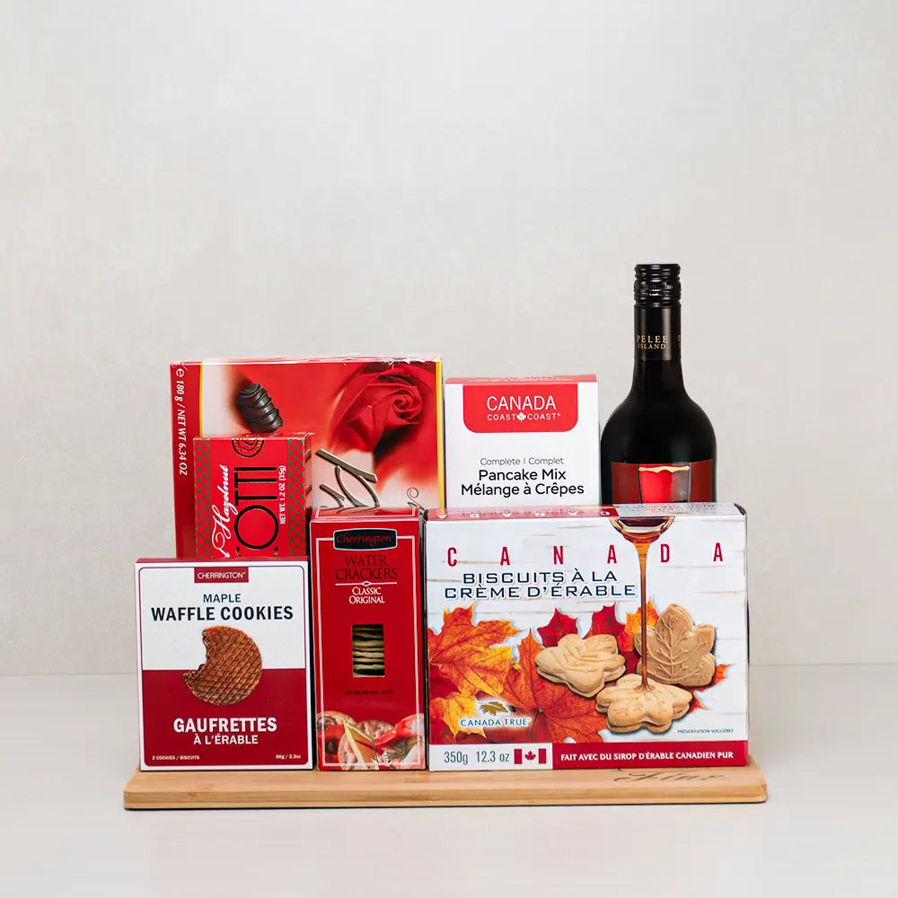 Thinking of You Gourmet Set with Pelee Island red wine, praline chocolates, maple cream cookies and pancake mix on bamboo