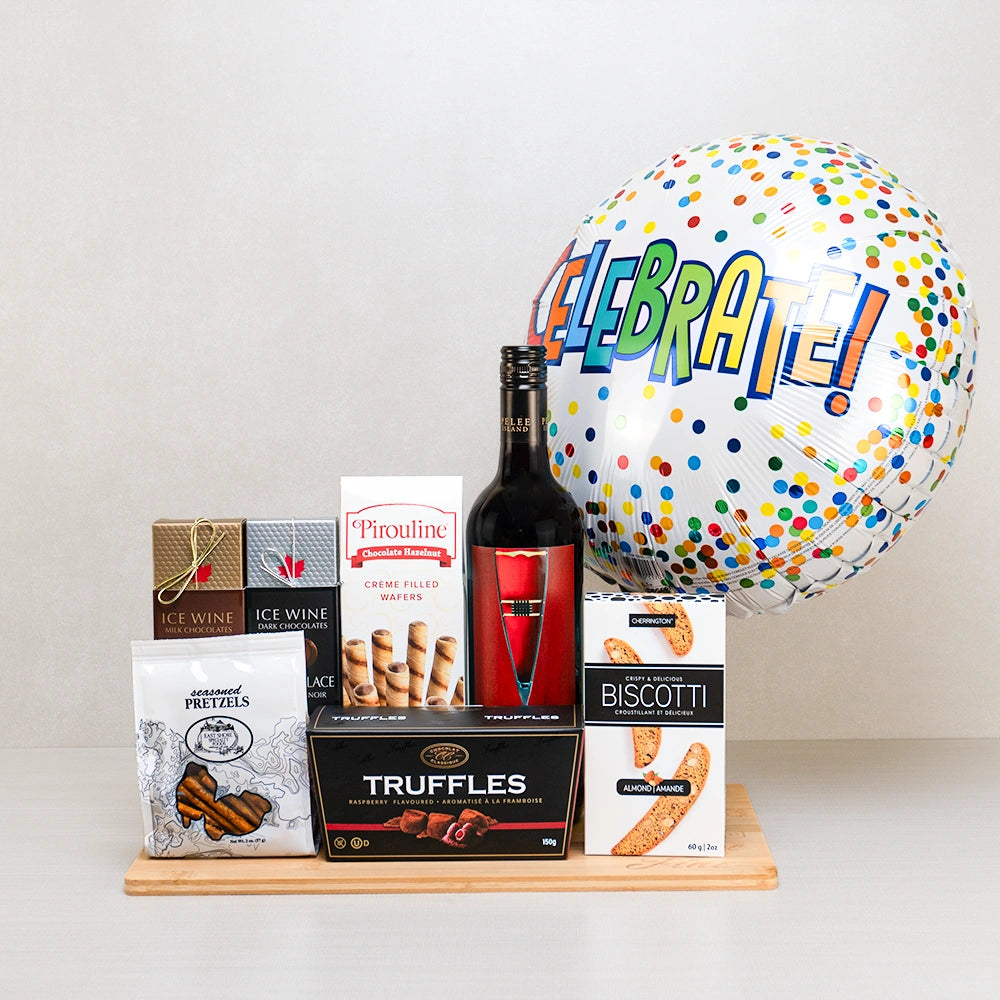 Birthday Gift Basket for Her with red wine, a Celebrate balloon, ice wine chocolates, raspberry truffles and Pirouline wafers