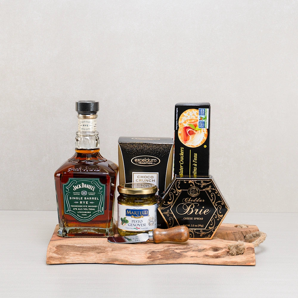 Whiskey & Delights Royal Set with Jack Daniel's Single Barrel Rye, Martelli pesto and cheddar brie spread on a wood slab
