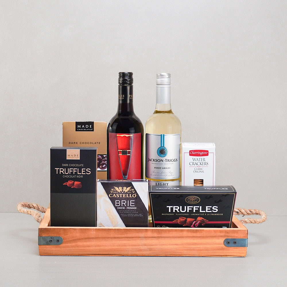 The Grand Wine Duo Gift Set with red wine, Jackson-Triggs Pinot Grigio, Castello brie and truffles on a rope-handled tray