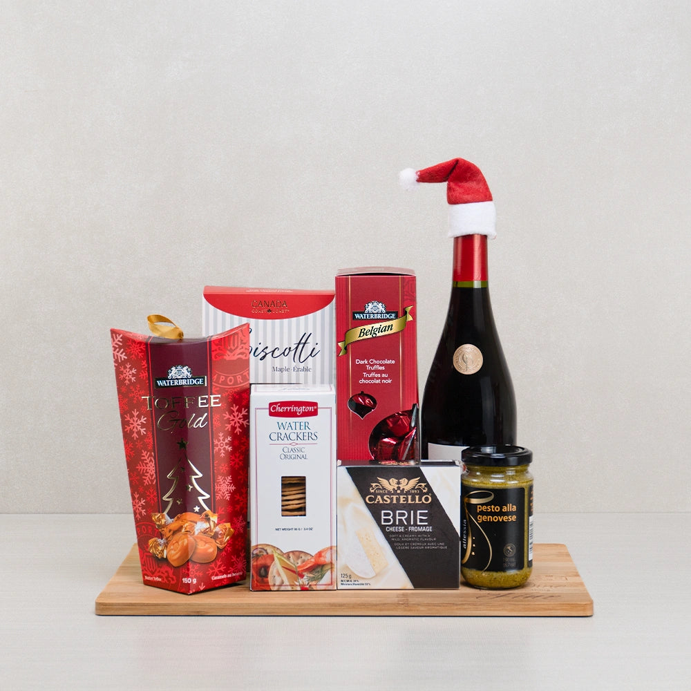 Festive Toffee and Cheese Cracker Duo gift basket with wine in a Santa hat, Toffee Gold, Belgian truffles and Castello brie
