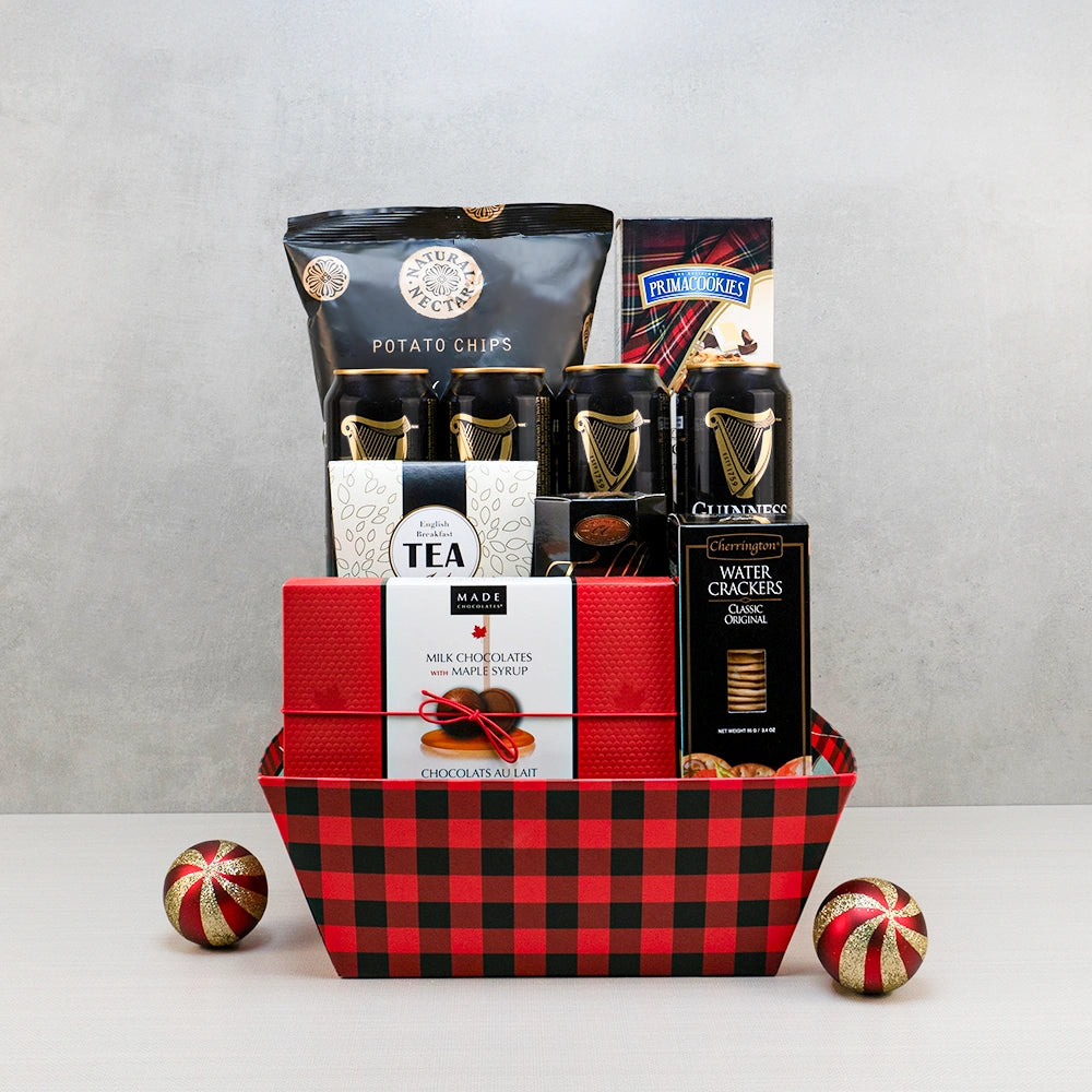 Beer & Snacks Gift Basket in red buffalo plaid with four Guinness cans, Natural Nectar potato chips, maple chocolates and tea