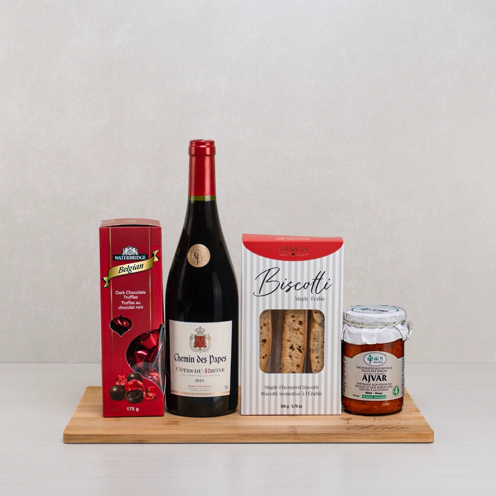 Truffle Bliss with Fine Wine gift set: Côtes du Rhône, Waterbridge Belgian truffles, maple biscotti and ajvar on bamboo