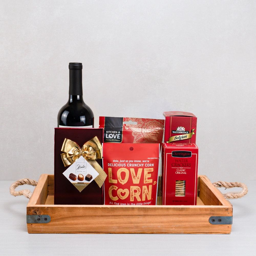 Red Wine & Artisan Treats Hamper with red wine, Hamlet chocolates, Waterbridge truffles and Love Corn in a rope-handled tray