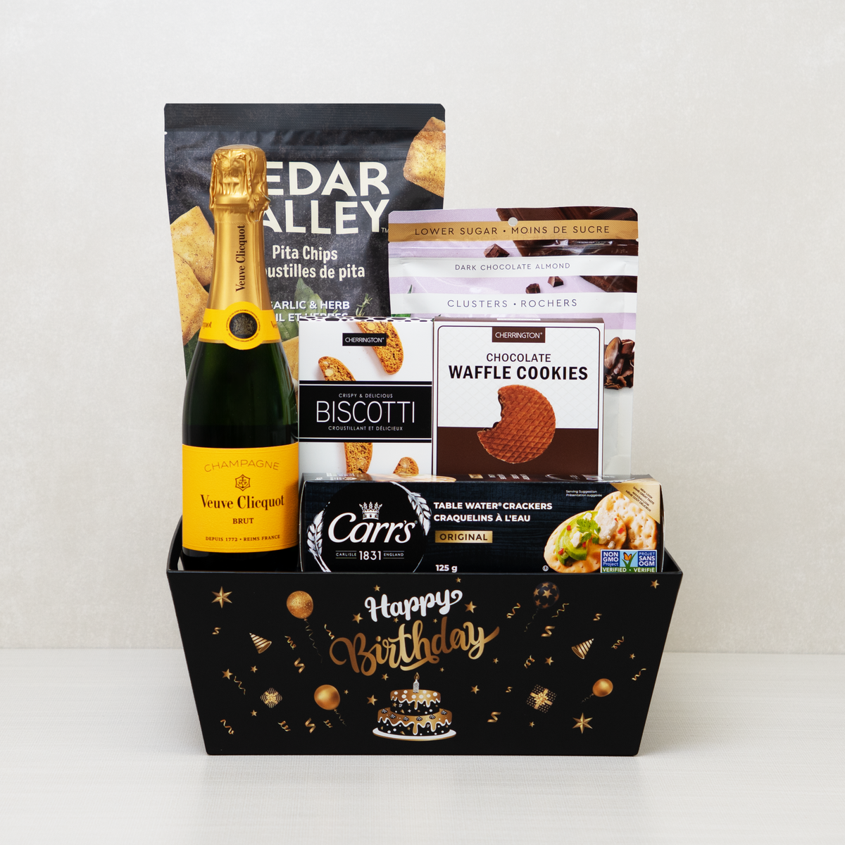 Pop the Bubbly Birthday Basket with champagne, biscotti, water crackers, cookies, chocolate almond clusters, and chips.