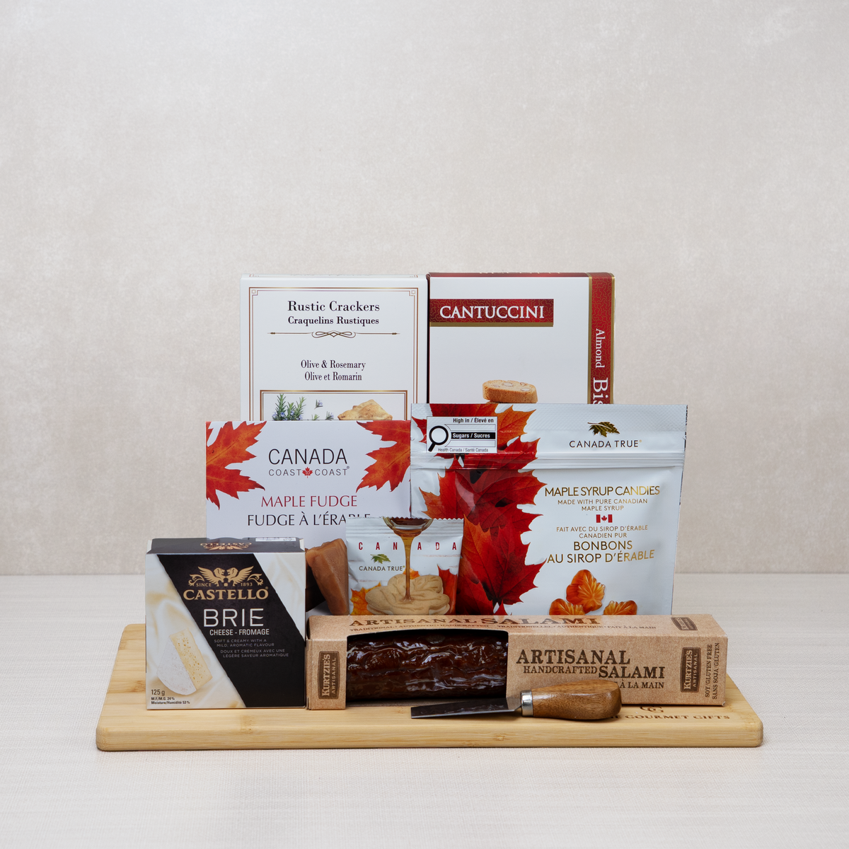 Thanksgiving Gathering Gift Basket with brie, salami, crackers, cheese knife, maple candies, fudge & biscotti.