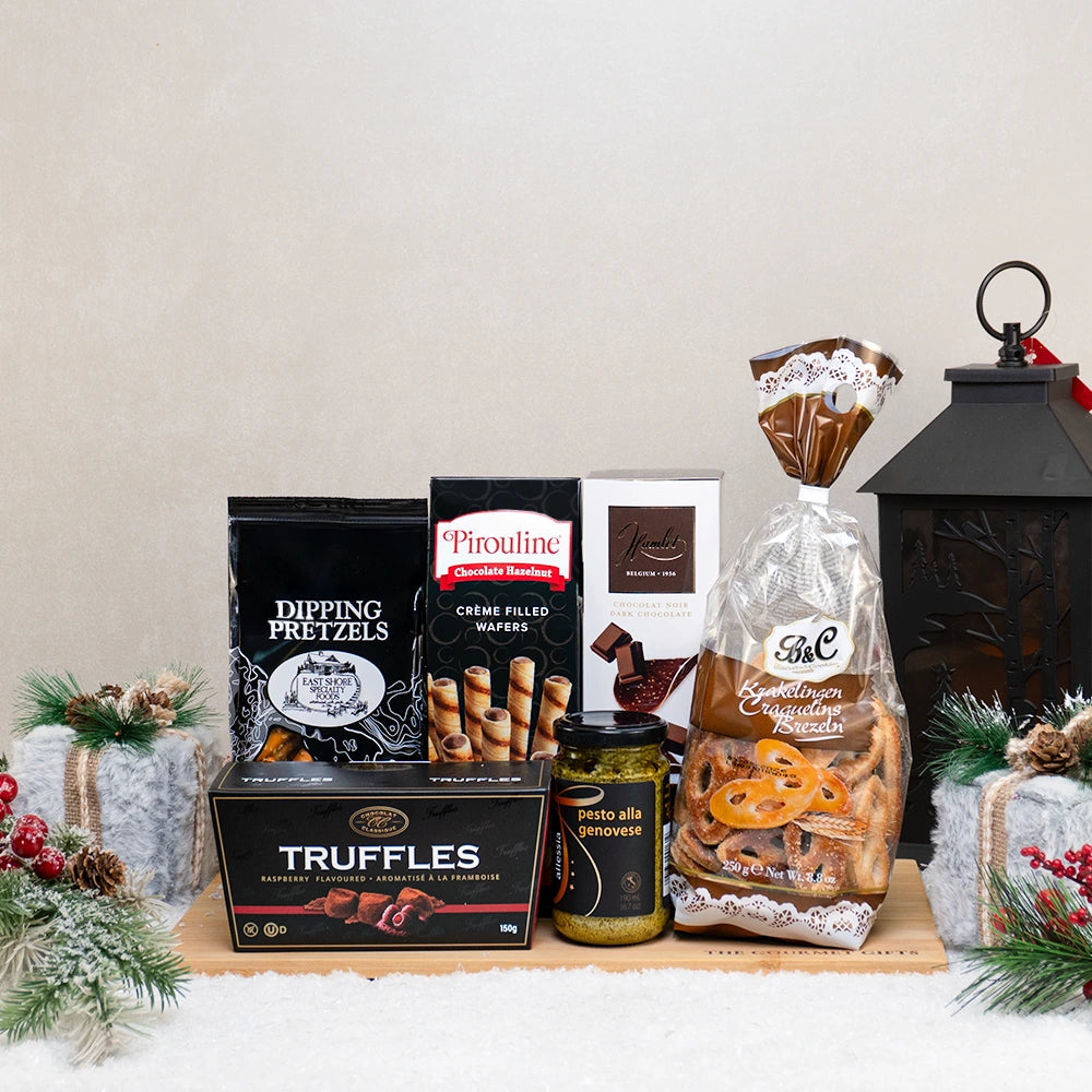 The Season to Shine gift basket with raspberry truffles, puff pastry, Pirouline wafers, Hamlet dark chocolate and pesto